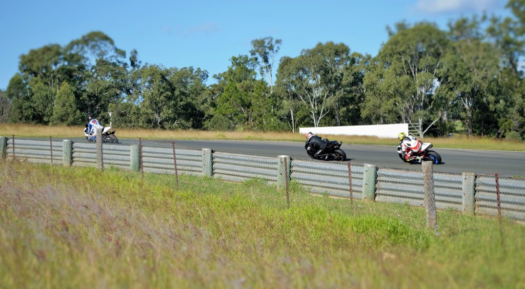 Getting my lean angle on at Hungry corner, I'm the rider in black, middle position