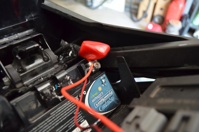 Connect the positive cable to your corresponding battery terminal. If you want to get fancy, splice the cable into a power cable that turns on with your accessories. 